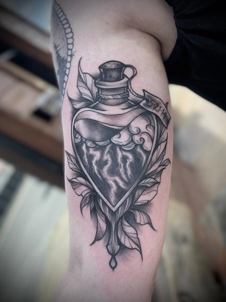 Shanoah Chapman - Glass heart tattoo